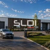 Locaux d'activités A VENDRE OU A LOUER - GUEREINS - 1 700 m²